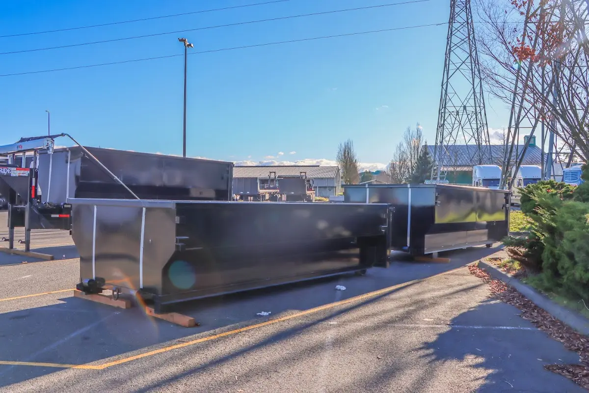 Roll-off dumpster ready for waste disposal at job site for Roofing Dumpster Rental in Troy
